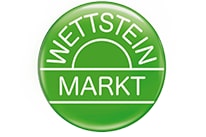 Grünes Logo mit Text 'Wettstein Markt'.