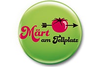 Grüner Button mit rotem Apfel und Pfeil, Text 'Märt am Tellplatz'.