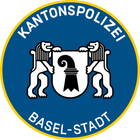 Patch der Kantonspolizei Basel-Stadt, zwei Löwen halten einen Schild mit dem Baslerstab