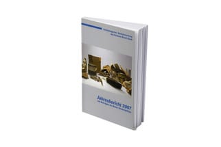 Jahresbericht 2007 Buchdeckel, stapelweise Geldscheine abgebildet.