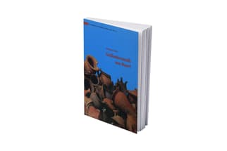 Blaues Buchcover mit Töpferwarenbild.