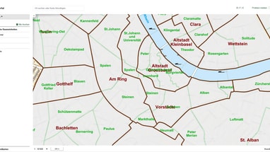 Stadtkarte von Basel mit farbigen Bezirken und Flusslauf des Rheins.