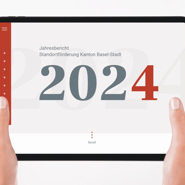 Tablet mit Jahresbericht 2024 auf dem Bildschirm.