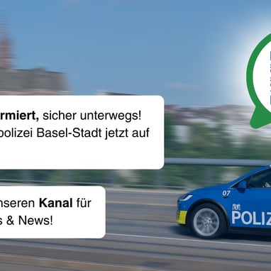 Polizeiauto mit WhatsApp-Werbung und QR-Code in Basel-Stadt.