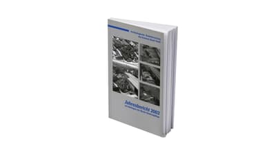 Jahresbericht 2003 Buch mit Bildern auf dem Cover.