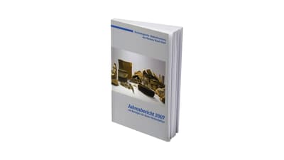 Jahresbericht 2007 Buchdeckel, stapelweise Geldscheine abgebildet.