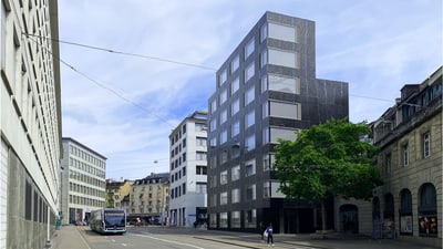 Strassenszene mit modernen Gebäuden und einer Strassenbahn.",