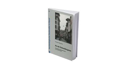 Buch mit Gebäude auf dem Cover, 'An der Schneidergasse'.
