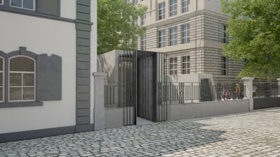 Gepflasterter Weg vor einem modernen Gebäude mit Bäumen.