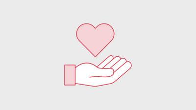 Hand mit Herz-Symbol darüber.