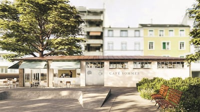 Aussenansicht von Café mit Baum und Bänken davor.