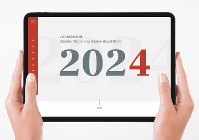 Tablet mit Jahresbericht 2024 auf dem Bildschirm.