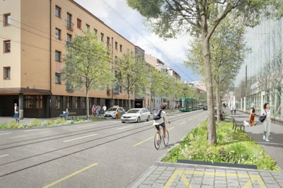 Stadtstrasse mit Fahrradfahrer, Autos und Strassenbahn